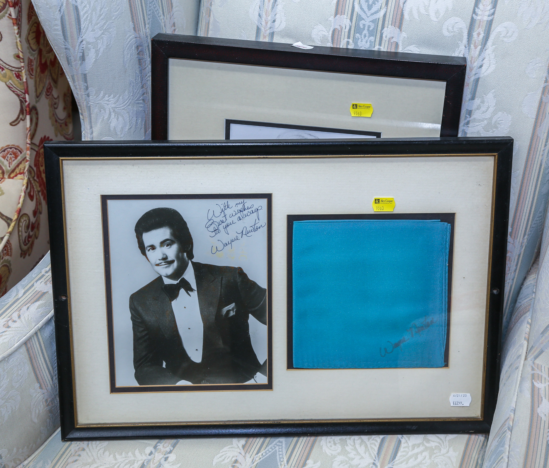 TWO FRAMED CELEBRITY PHOTOS