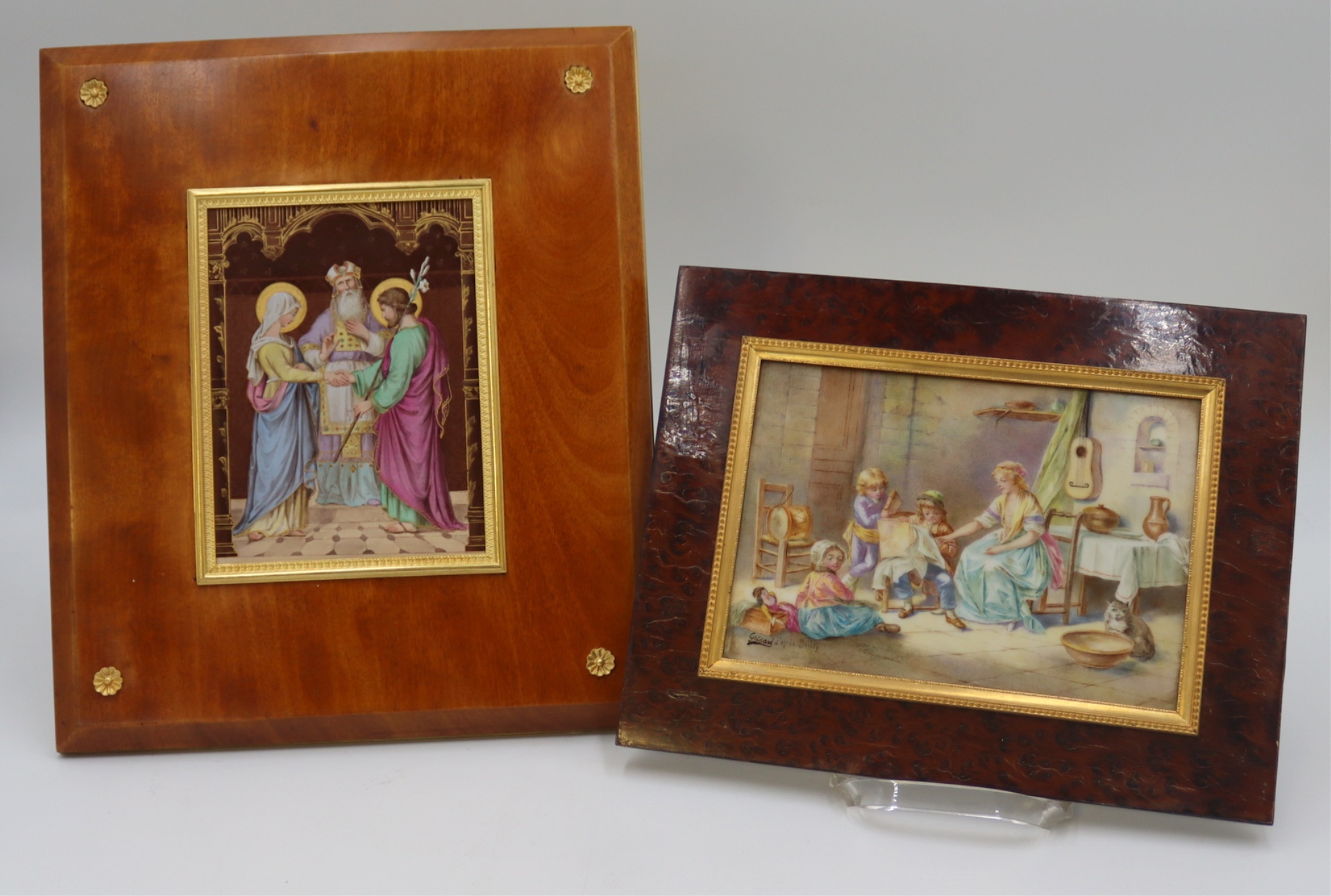 TWO FRAMED ENAMEL PLAQUES. Includes