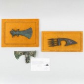 TWO FRAMED LURISTAN BRONZE AXE