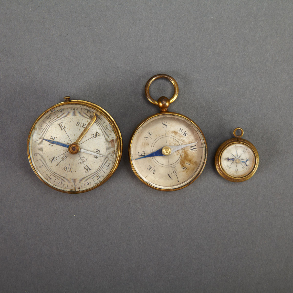 Two French Lacquered Brass Pocket
