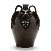 TWO GALLON FACE JUG, CHARLES L