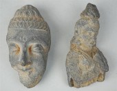TWO GANDARHAN GREY SCHIST HEAD