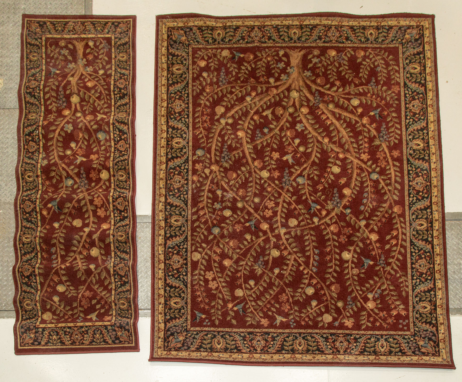 TWO GARDEN DESIGN MACHINE MADE RUGS