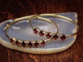 TWO GARNET AND DIAMOND BANGLES