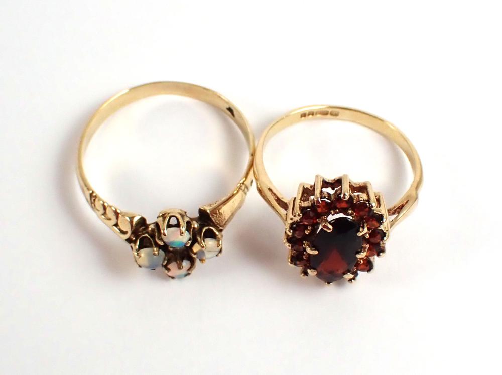 TWO GEMSTONE AND YELLOW GOLD RINGS,