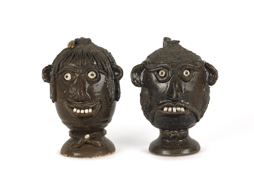 Two Georgia stoneware face jugs