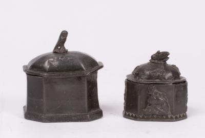 Two Georgian lead tobacco jars,