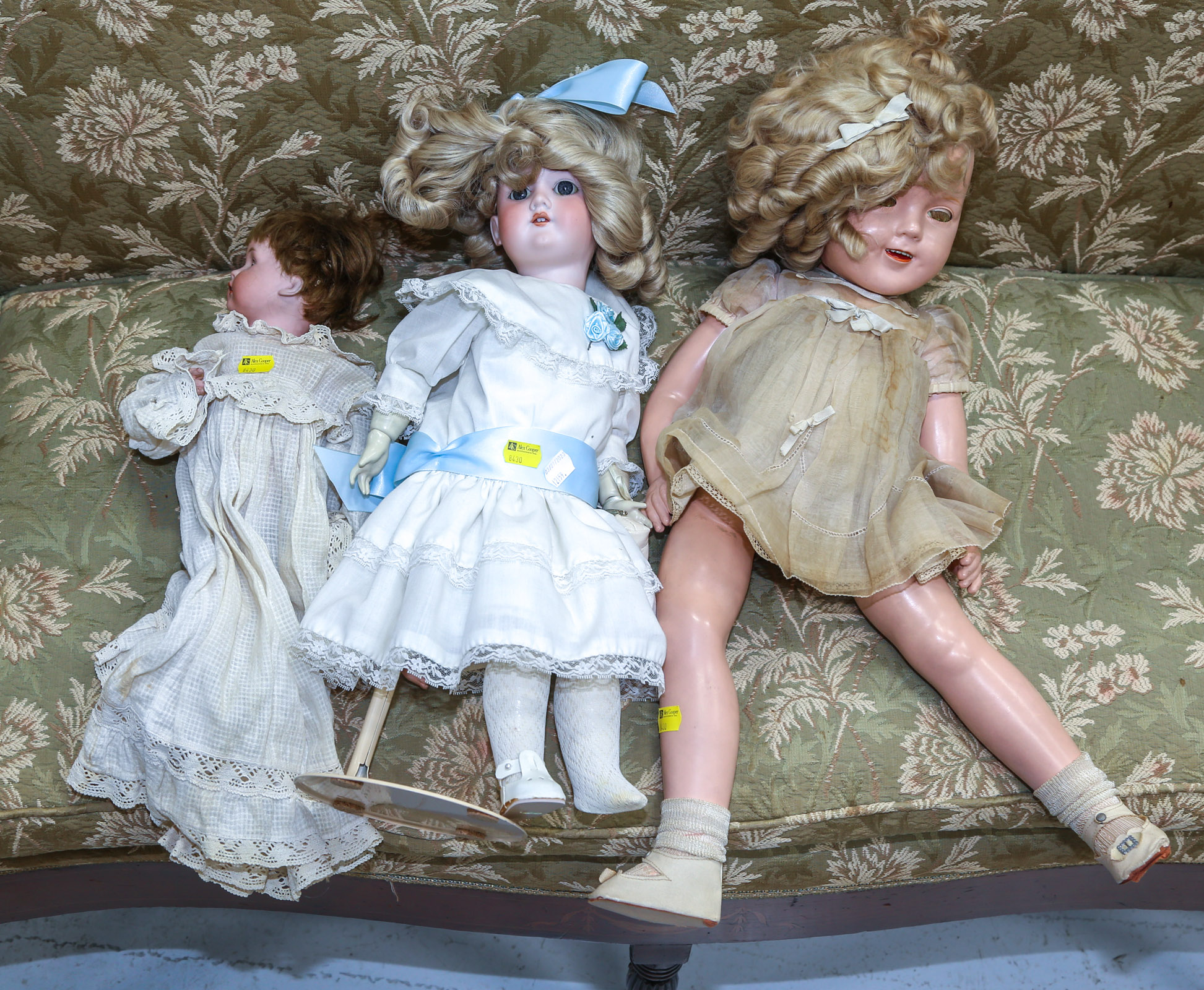 TWO GERMAN BISQUE BEAD DOLLS With a