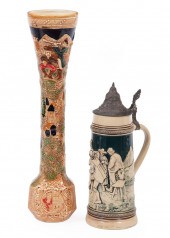 TWO GERMAN POTTERY BEER STEINS