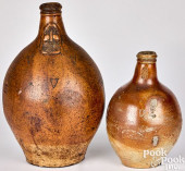 TWO GERMAN STONEWARE BELLARMIN