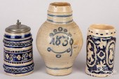 TWO GERMAN STONEWARE TANKARDS