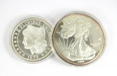 TWO GIANT HALF-POUND SILVER BU