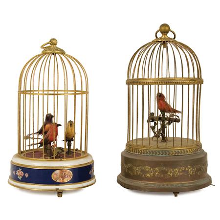Two Gilt-Metal Singing Birdcages 