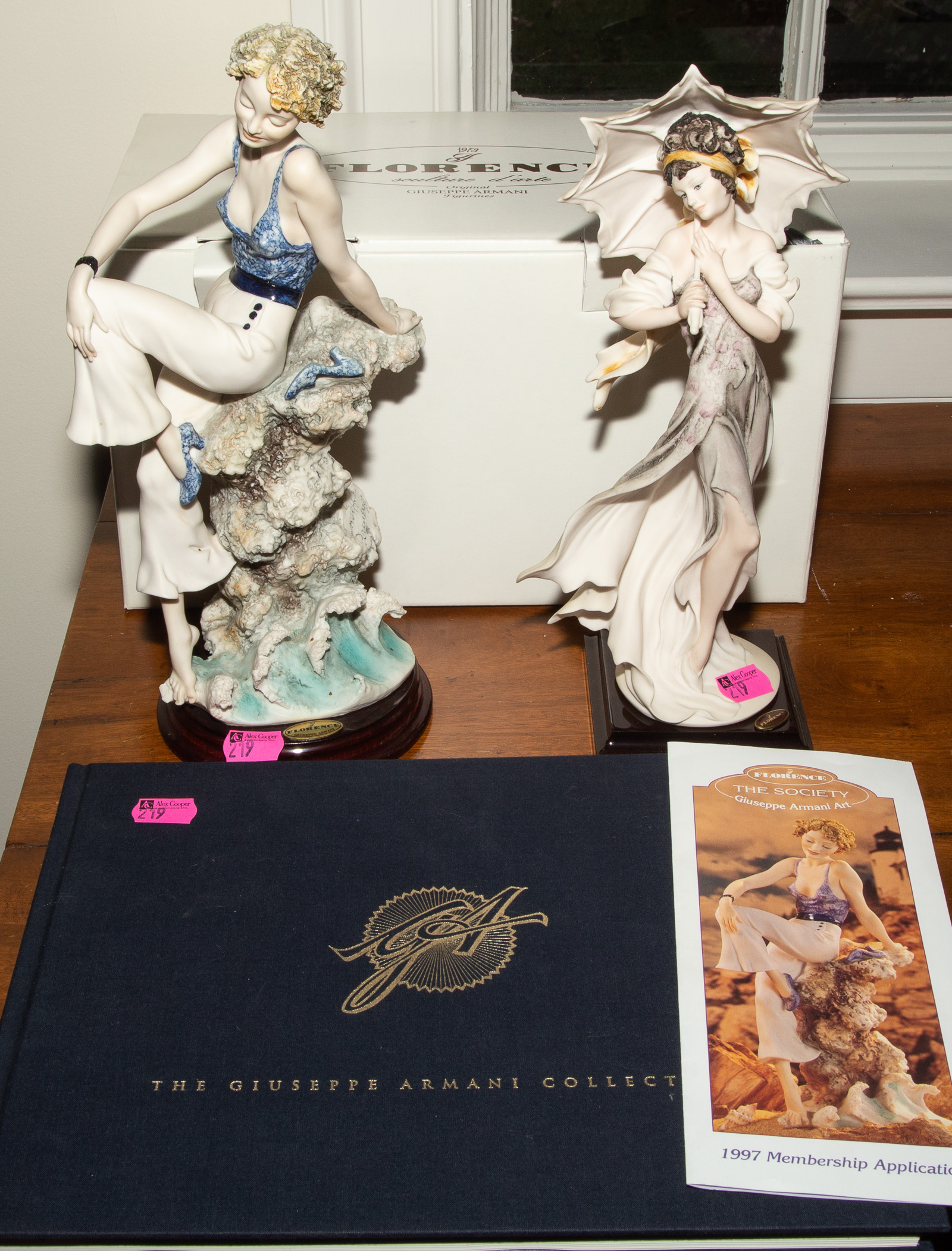 TWO GIUSEPPE ARMANI FIGURINES Along