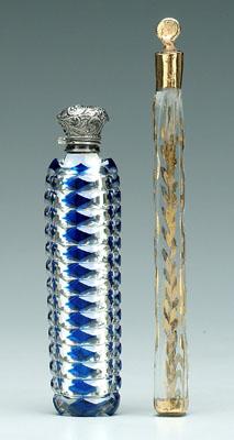 Two glass perfumes: one cobalt