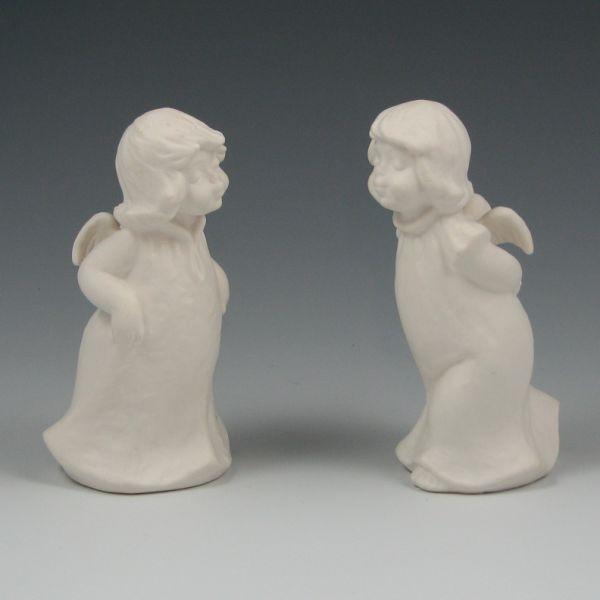 Two Goebel angels in bisque finish.