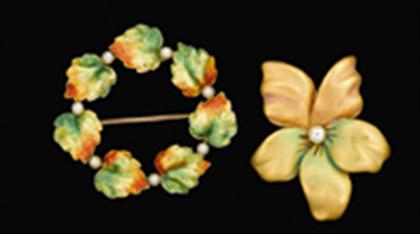 Two gold and enamel flower brooches