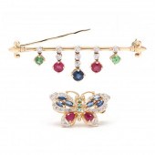 TWO GOLD AND GEM-SET BROOCHES