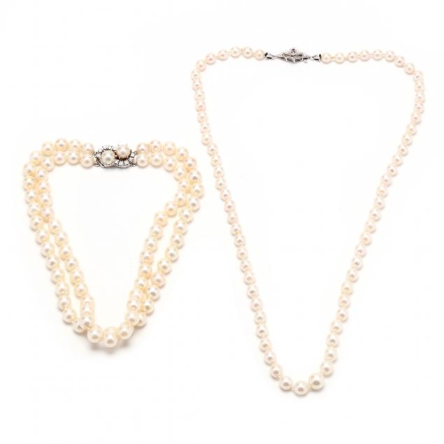 TWO GOLD AND GEM-SET PEARL