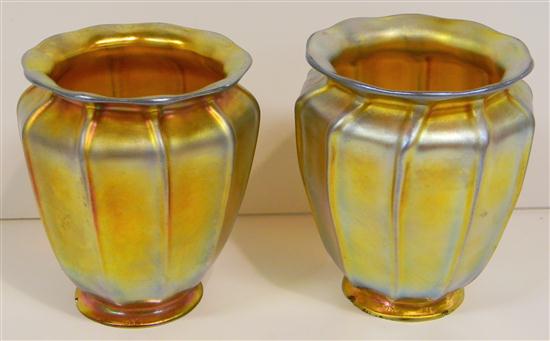 Two gold iridescent art glass