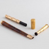 TWO GOLD MOUNTED CIGARETTE HOL