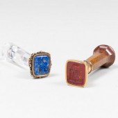 TWO GOLD-MOUNTED HARDSTONE SEA