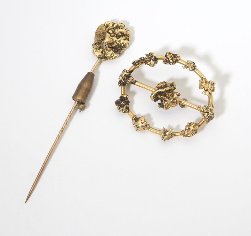 Two gold nugget pins Tested between