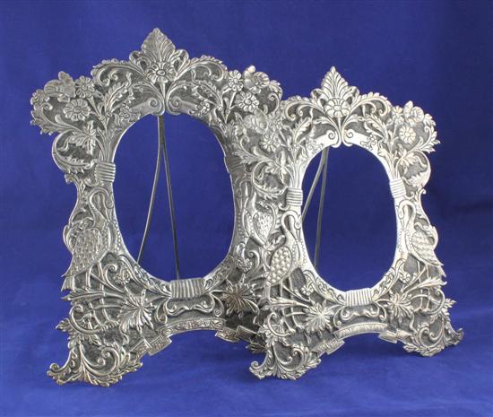 Two graduated Indian white metal