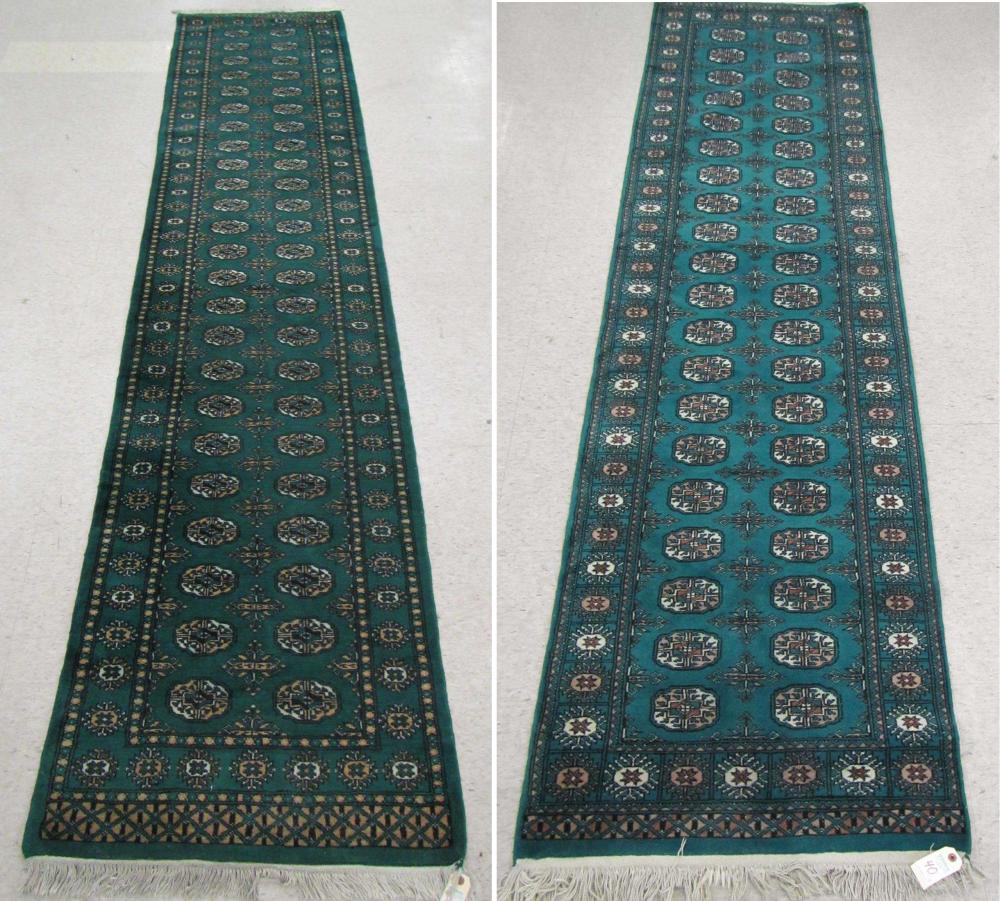 TWO GREEN BOKHARA RUNNERS, BOTH