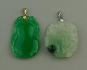 TWO GREEN JADE AND 14K PENDANT
