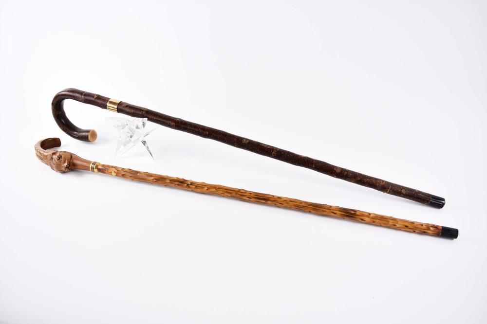TWO GUCCI NATURAL WOOD CANESBoth