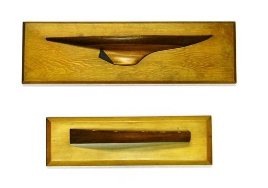 Two half-hull ship models  one