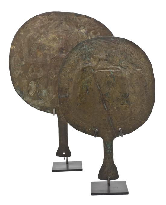 Two Hammered Brass Fans each having