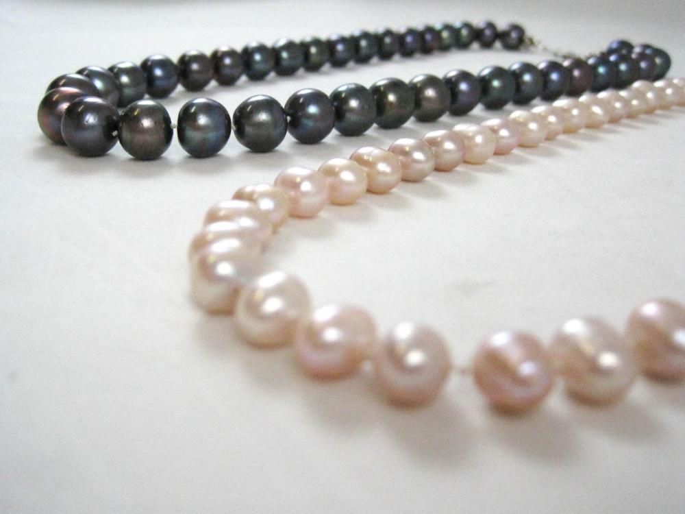 TWO HAND-KNOTTED COLORED PEARL