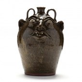 TWO HANDLED FACE JUG, KIM ELLI