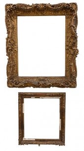 TWO HEAVILY CARVED GILT FRAMES
