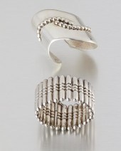 TWO HECTOR AGUILAR SILVER BRAC