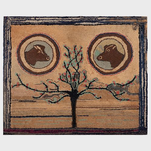 TWO HOOKED RUGS WITH A PAIR OF COWS