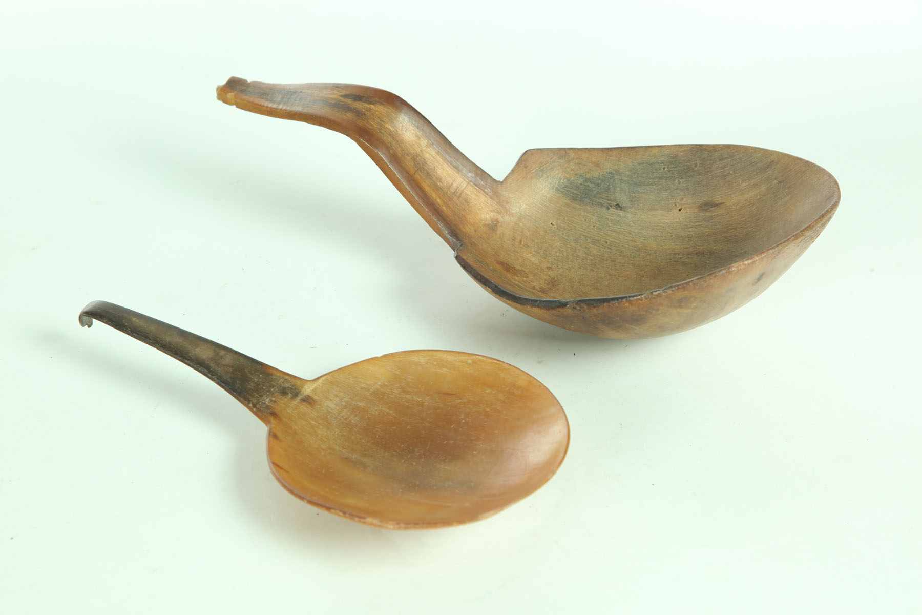 TWO HORN BUTTER PADDLES.  American