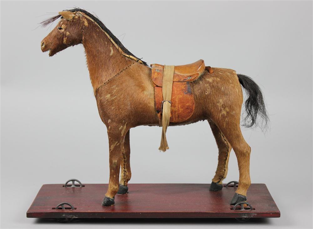 TWO HORSE PULL TOYS one with fabric