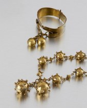TWO HUBERT HARMON MIXED-METAL
