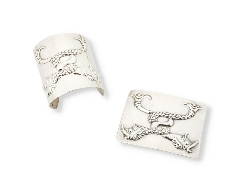 TWO HUBERT HARMON SILVER REPOUSSé