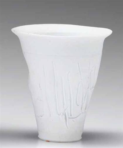 Two incised porcelain vases   