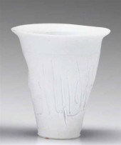 Two incised porcelain vases
