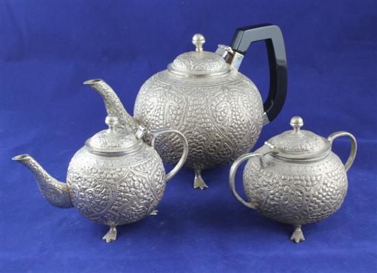 Two Indian graduated white metal