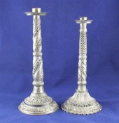 Two Indian white metal candles