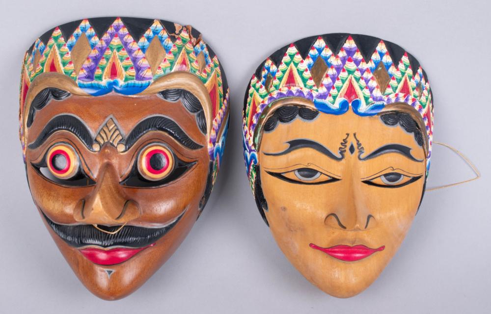 TWO INDONESIAN POLYCHROME CARVED