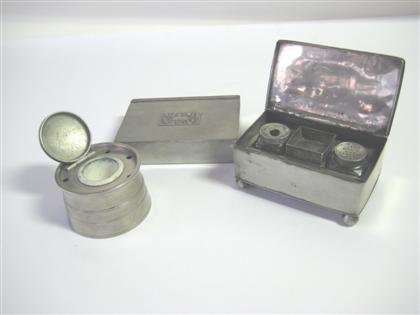 Two ink stands and an inkwell   