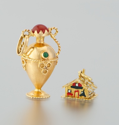 Two Interesting Charms 18k yellow