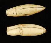 TWO INUIT CARVED SEAL-FORM ITE